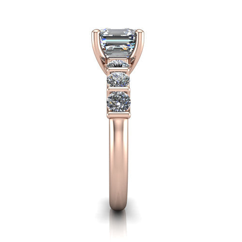 Liora square emerald solitaire engagement ring in 14K Rose Gold, side profile showing the side accents and polished band