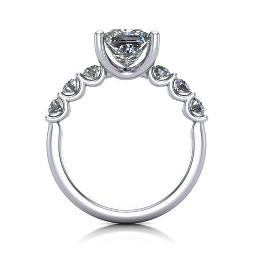 Liora princess solitaire engagement ring in 18K White Gold, through-finger front profile showing the graduated side stones and open basket