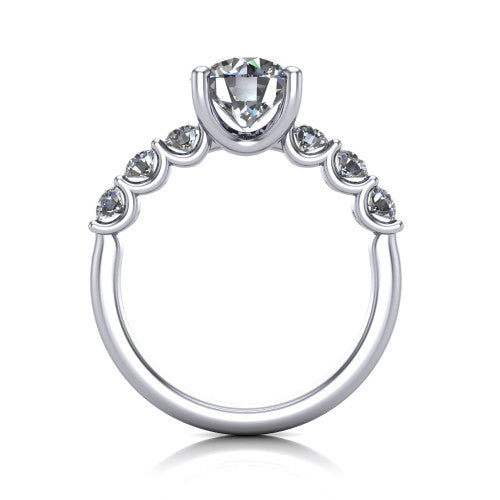 Liora round solitaire engagement ring in Platinum, through-finger front profile showing the graduated side stones and open basket
