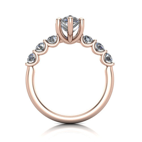 Liora pear solitaire engagement ring in 18K Rose Gold, through-finger front profile showing the graduated side stones and open basket