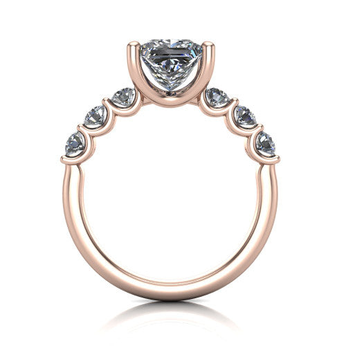 Liora princess solitaire engagement ring in 14K Rose Gold, through-finger front profile showing the graduated side stones and open basket