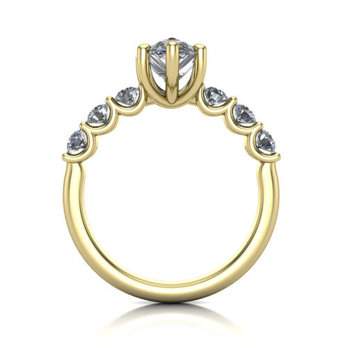 Liora pear solitaire engagement ring in 14K Yellow Gold, through-finger front profile showing the graduated side stones and open basket