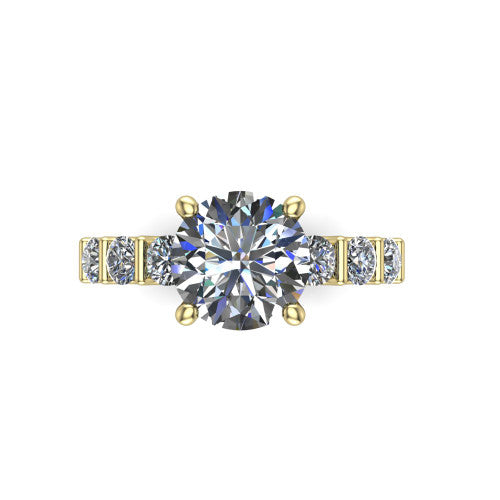 Liora round solitaire engagement ring in 18K Yellow Gold, top-down view showing the round center diamond and bar-set side accents