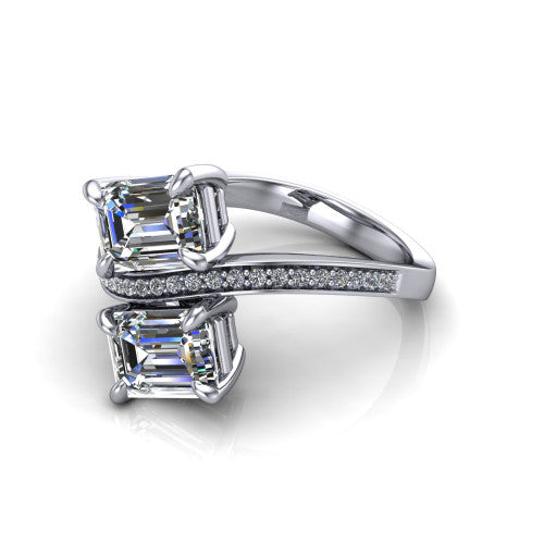 Elowen emerald two stone engagement ring in 18K White Gold, three-quarter perspective showing two emerald diamonds on a pave bypass band