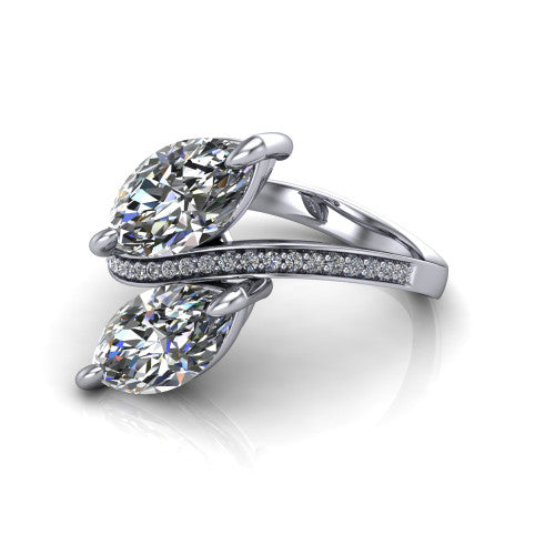 Elowen marquise two stone engagement ring in 18K White Gold, three-quarter perspective showing two marquise diamonds on a pave bypass band