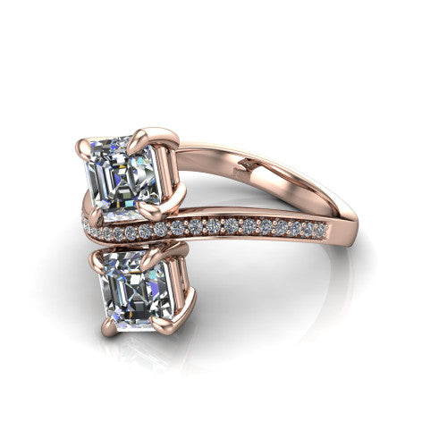 Elowen square emerald two stone engagement ring in 18K Rose Gold, three-quarter perspective showing two square emerald diamonds on a pave bypass band