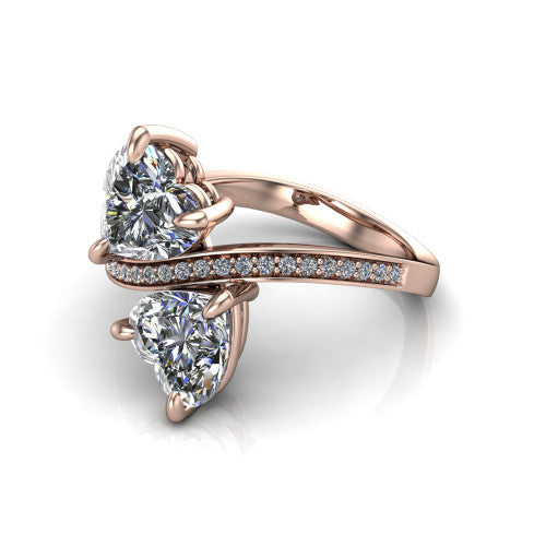 Elowen heart two stone engagement ring in 14K Rose Gold, three-quarter perspective showing two heart diamonds on a pave bypass band