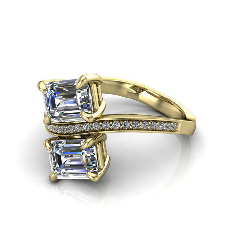 Elowen emerald two stone engagement ring in 18K Yellow Gold, three-quarter perspective showing two emerald diamonds on a pave bypass band