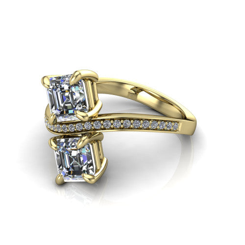Elowen square emerald two stone engagement ring in 14K Yellow Gold, three-quarter perspective showing two square emerald diamonds on a pave bypass band