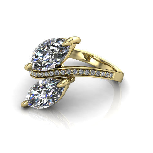 Elowen marquise two stone engagement ring in 18K Yellow Gold, three-quarter perspective showing two marquise diamonds on a pave bypass band