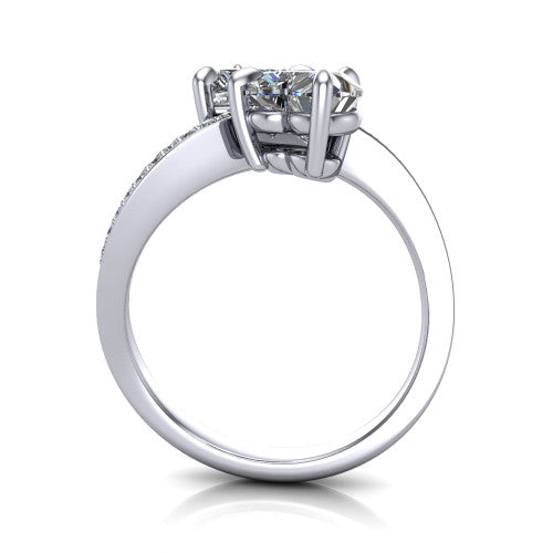 Elowen heart two stone engagement ring in Platinum, through-finger front profile showing the pave bypass band
