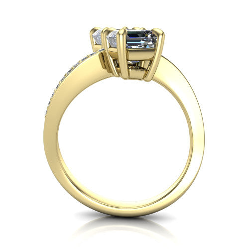 Elowen square emerald two stone engagement ring in 14K Yellow Gold, through-finger front profile showing the pave bypass band