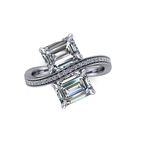Elowen emerald two stone engagement ring in 14K White Gold, top-down view showing the two emerald diamonds set diagonally