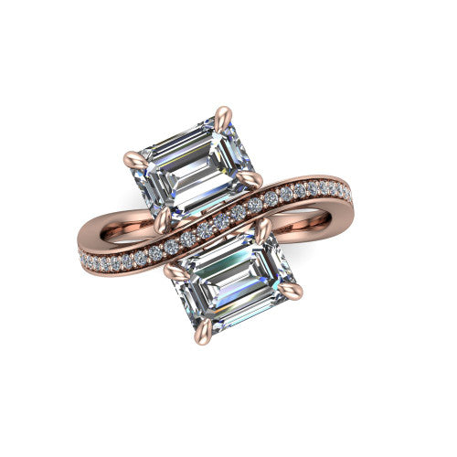 Elowen emerald two stone engagement ring in 18K Rose Gold, top-down view showing the two emerald diamonds set diagonally