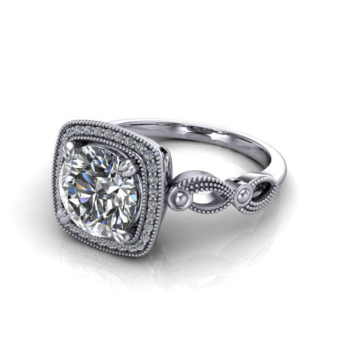 Phoenix round vintage halo engagement ring in Platinum, three-quarter perspective showing the round center diamond, vintage cushion halo, and infinity-twist band