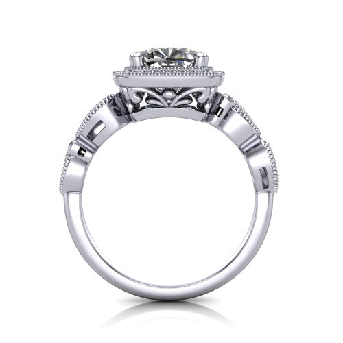 Phoenix cushion-cut vintage halo engagement ring in 18K White Gold, through-finger front profile showing the ornate filigree gallery beneath the halo