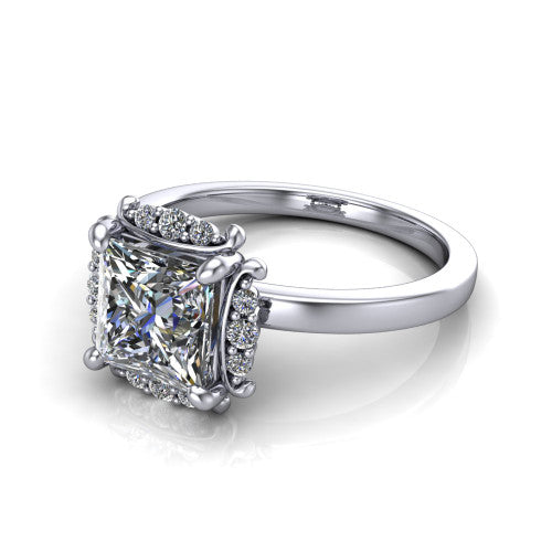 Mckenna princess-cut halo engagement ring in Platinum, three-quarter perspective showing the princess-cut center diamond, diamond halo, and polished band