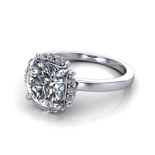 Mckenna round halo engagement ring in Platinum, three-quarter perspective showing the round center diamond, diamond halo, and polished band