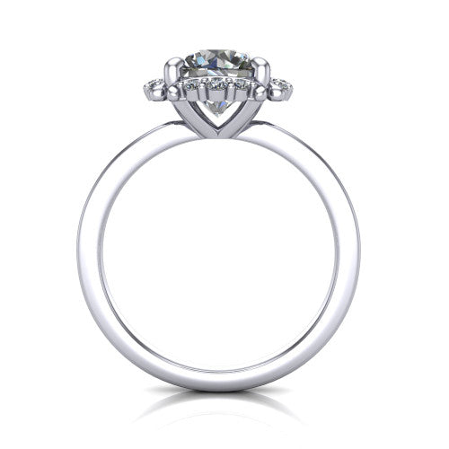 Mckenna round halo engagement ring in Platinum, through-finger front profile showing the halo and double-claw prongs