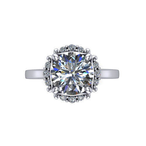Mckenna round halo engagement ring in Platinum, top-down view showing the round center diamond framed by the diamond halo