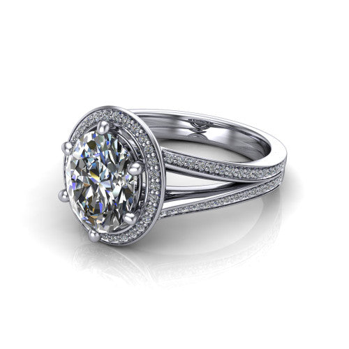 Lyra oval halo engagement ring in 18K White Gold, three-quarter perspective showing the brilliant oval center diamond inside a squared pave halo on a pave split shank