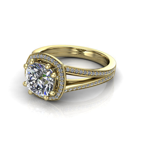 Lyra cushion halo engagement ring in 18K Yellow Gold, three-quarter perspective showing the brilliant cushion-cut center diamond inside a squared pave halo on a pave split shank