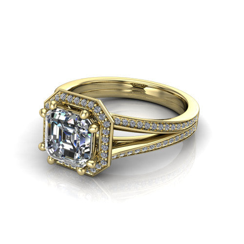 Lyra square emerald halo engagement ring in 18K Yellow Gold, three-quarter perspective showing the step-cut square emerald center diamond inside a squared pave halo on a pave split shank