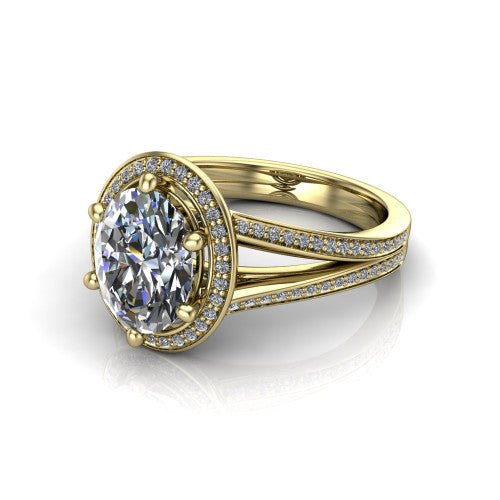 Lyra oval halo engagement ring in 18K Yellow Gold, three-quarter perspective showing the brilliant oval center diamond inside a squared pave halo on a pave split shank