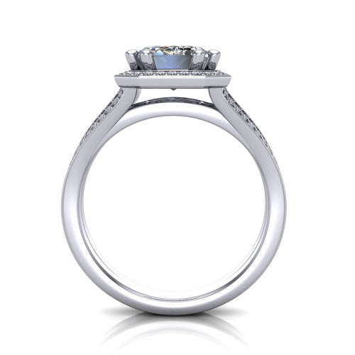 Lyra emerald halo engagement ring in 18K White Gold, through-finger front profile showing the squared halo head and split shank shoulders
