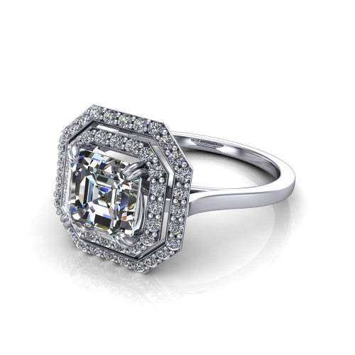 Gwendolyn square emerald halo engagement ring in Platinum, three-quarter perspective showing the step-cut square emerald center diamond framed by two pave diamond halos and a polished knife-edge shank