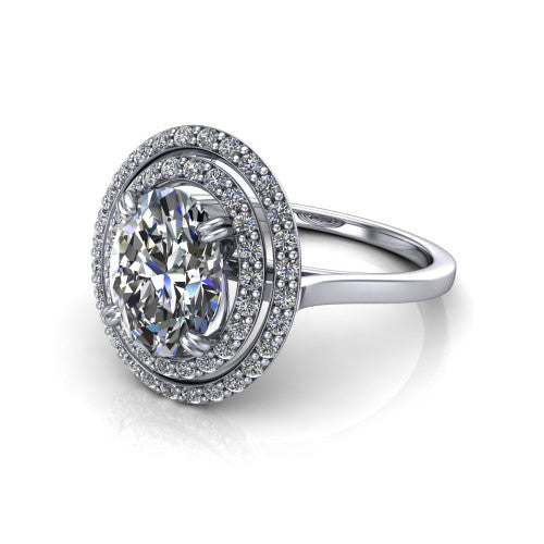 Gwendolyn oval halo engagement ring in 14K White Gold, three-quarter perspective showing the brilliant oval center diamond framed by two pave diamond halos and a polished knife-edge shank