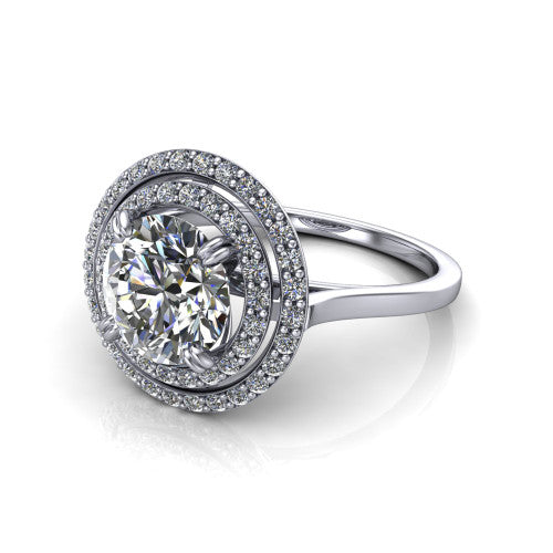 Gwendolyn round halo engagement ring in Platinum, three-quarter perspective showing the brilliant round center diamond framed by two pave diamond halos and a polished knife-edge shank