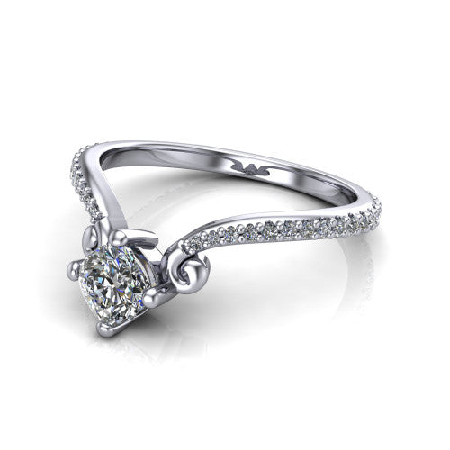 Aveline cushion solitaire engagement ring in Platinum, three-quarter perspective showing the cushion center diamond above a chevron pave band with scroll shoulders
