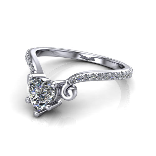Aveline heart solitaire engagement ring in Platinum, three-quarter perspective showing the heart center diamond above a chevron pave band with scroll shoulders
