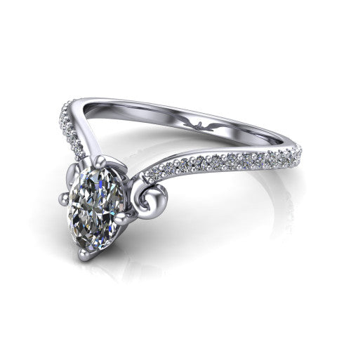 Aveline oval solitaire engagement ring in Platinum, three-quarter perspective showing the oval center diamond above a chevron pave band with scroll shoulders