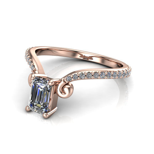 Aveline emerald solitaire engagement ring in 18K Rose Gold, three-quarter perspective showing the emerald center diamond above a chevron pave band with scroll shoulders