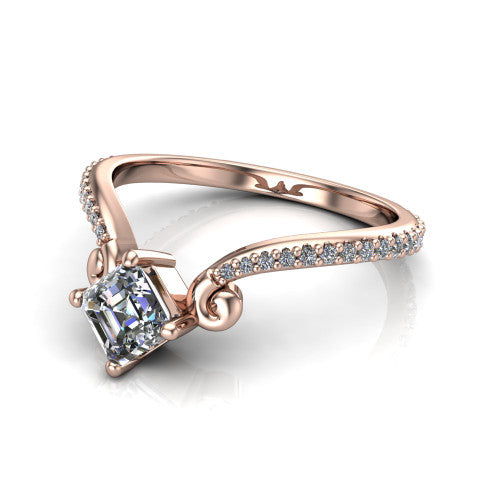 Aveline square emerald solitaire engagement ring in 18K Rose Gold, three-quarter perspective showing the square emerald center diamond above a chevron pave band with scroll shoulders