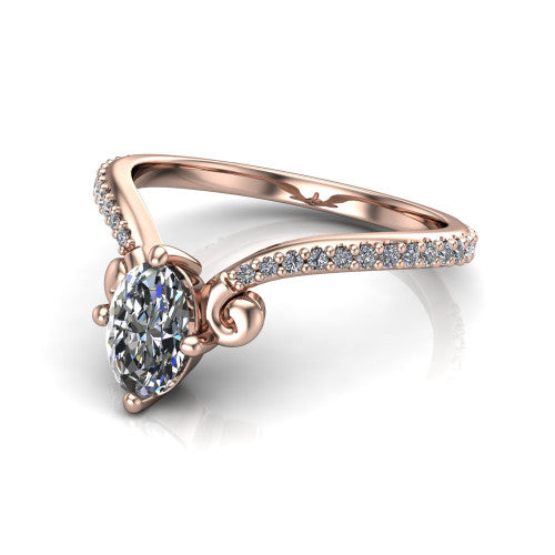 Aveline oval solitaire engagement ring in 14K Rose Gold, three-quarter perspective showing the oval center diamond above a chevron pave band with scroll shoulders