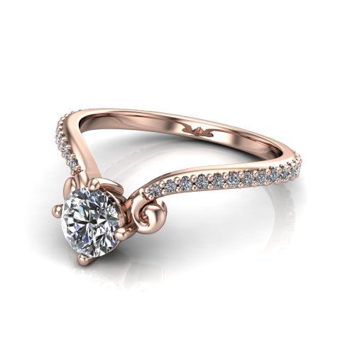 Aveline round solitaire engagement ring in 14K Rose Gold, three-quarter perspective showing the round center diamond above a chevron pave band with scroll shoulders