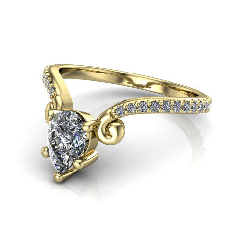 Aveline pear solitaire engagement ring in 18K Yellow Gold, three-quarter perspective showing the pear center diamond above a chevron pave band with scroll shoulders