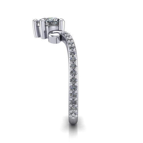 Aveline heart solitaire engagement ring in Platinum, side profile showing the peaked chevron pave band