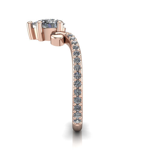 Aveline pear solitaire engagement ring in 14K Rose Gold, side profile showing the peaked chevron pave band