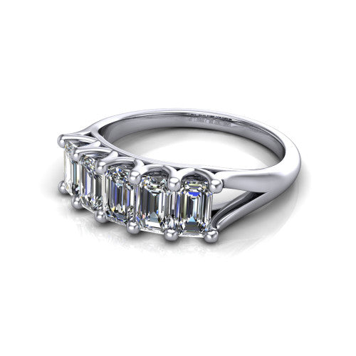 Holly emerald five stone engagement ring in 18K White Gold, three-quarter perspective showing five step-cut emerald diamonds set across the band in shared 4-prong claws on tapered cathedral shoulders
