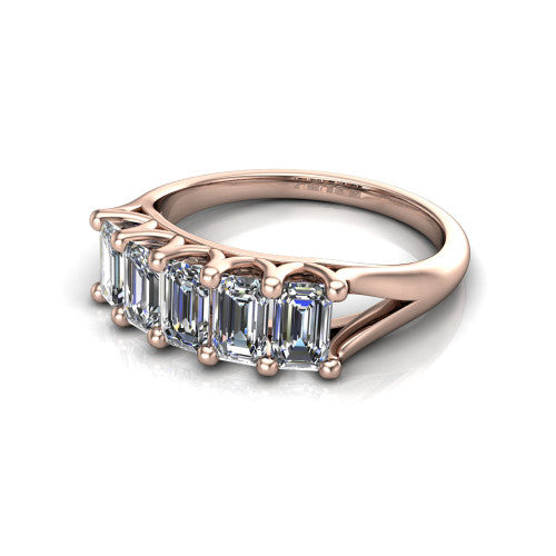 Holly emerald five stone engagement ring in 18K Rose Gold, three-quarter perspective showing five step-cut emerald diamonds set across the band in shared 4-prong claws on tapered cathedral shoulders