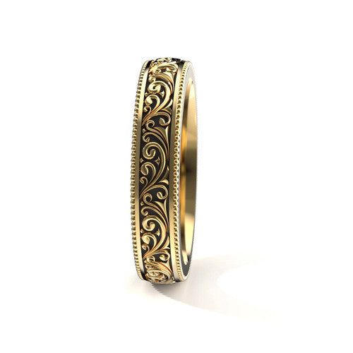 Elegant 14K yellow gold men's wedding band featuring intricate scrollwork and engraved edges