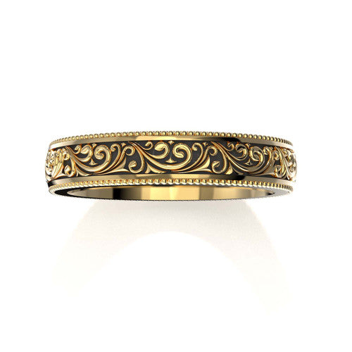 Classic men's yellow gold wedding ring with detailed scroll design and engraved borders