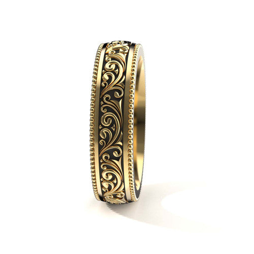 Elegant 14K yellow gold men's wedding band featuring intricate scrollwork and engraved edges