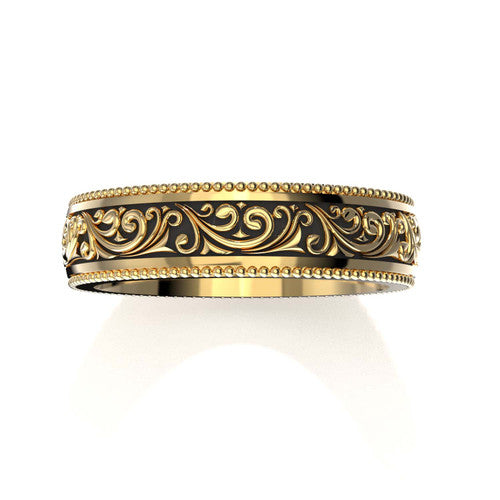 Classic men's yellow gold wedding ring with detailed scrollwork design and engraved borders