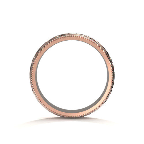 Handcrafted men's 14K rose gold ring showcasing scrollwork patterns and engraved borders