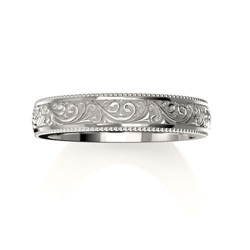 Classic men's white gold wedding ring with detailed scroll design and engraved borders